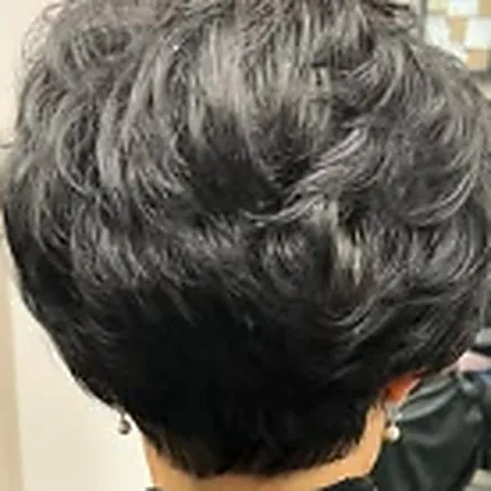 Textured dark short haircut with soft volume