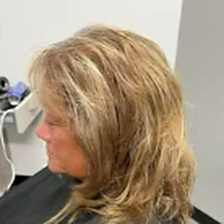 Blonde layered blow-out with movement