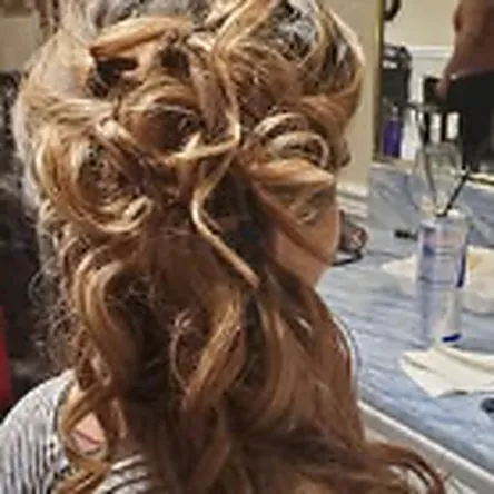 Dimensional bronde curls styled half-up