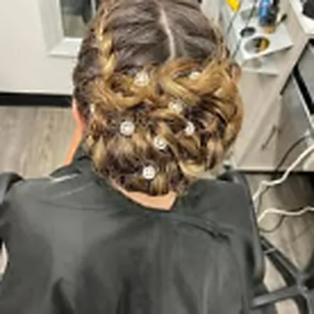 Braided blonde updo for a wedding party