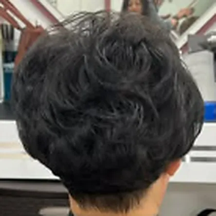 Dark cropped pixie cut with texture