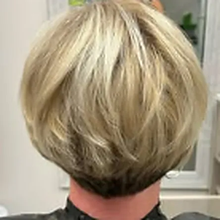 Blonde pixie cut with soft layers
