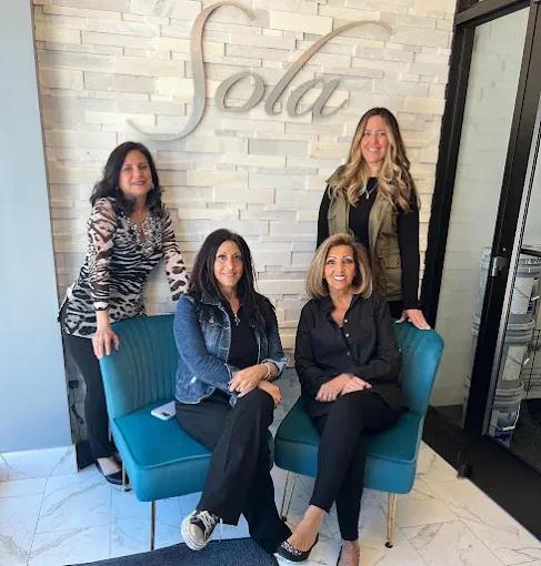The stylists of Charmed Beauty 9 & 18 inside Sola Salon Studios, Toms River NJ